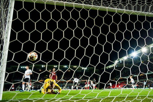 Anders Konradsen of Rosenborgs scores 2-0 behind goalkeeper