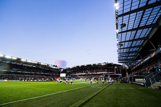 The players enter the field