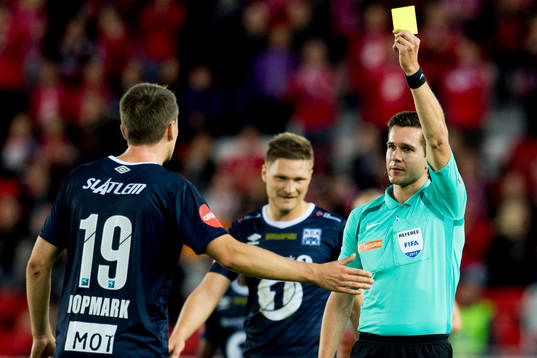 Andreas Eines Hopmark of Kristiansund receives a yellow