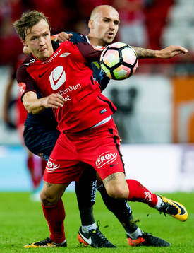 Fredrik Haugen of Brann and Nikita Baranov of Kristiansund