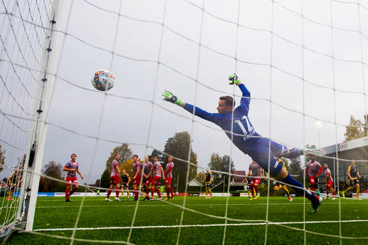 Tobias Christensen of Start scores 1-2 behind goalkeeper