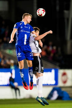 Sigurd Rosted of Sarpsborg and Nicklas Bendtner of Rosenborg
