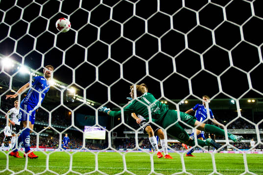 Sigurd Rosted of Sarpsborg scores 1-1 behind goalkeeper