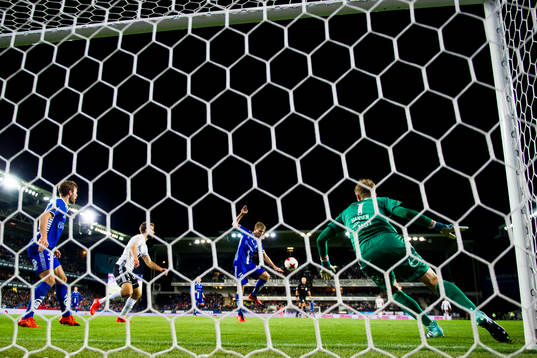 Sigurd Rosted of Sarpsborg scores 1-1 behind goalkeeper