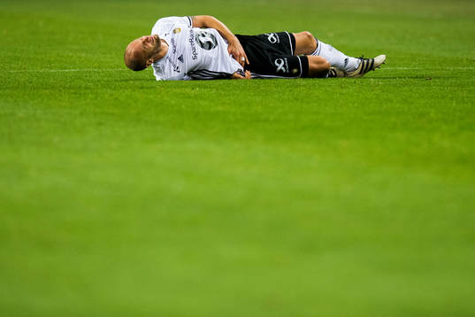 Tore Reginiussen of Rosenborg with an injury