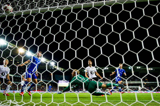 Sigurd Rosted of Sarpsborg scores 1-1 behind goalkeeper