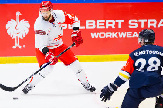 Martin Adamsky of Ocelari Trinec again Anton Bengtsson of