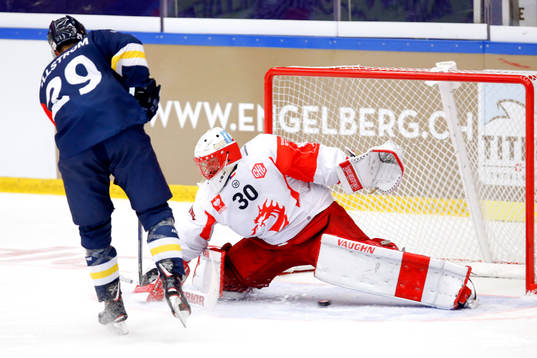Oscar Sundh of HV71 scores 2-1 behind goalkeeper Simon