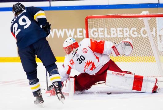 David Ullström of HV71 scores past Simon Hrubec goalkeeper