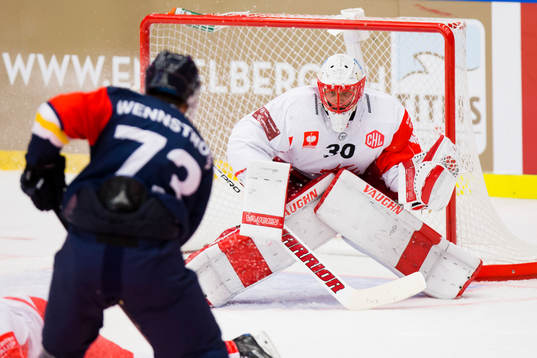 HV71 Sebastian Wännström of HV71 and Simon Hrubec of