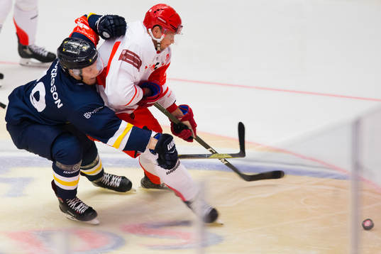 HV71 Erik Andersson of HV71 against Daniel Rakos of Ocelari