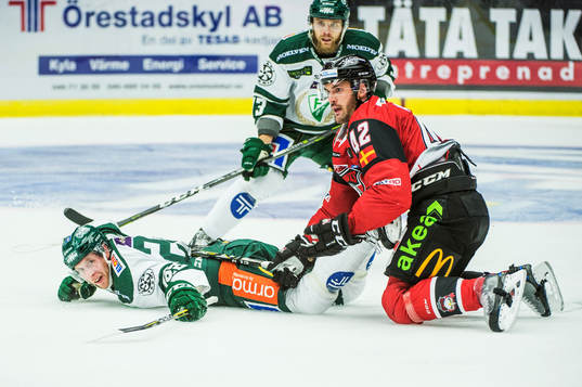 Färjestads Per Åslund och Malmö Redhawks Niklas Arell