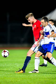 Alexander Sørloth of Norway and Cristian Brolli of San