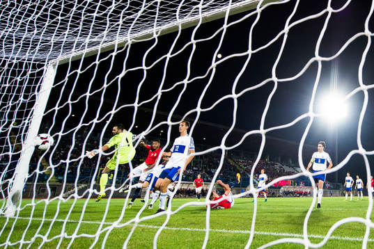 Joshua King of Norway scores 3-0 behind goalkeeper Aldo