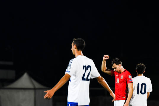 Ole Kristian Selnæs of Norway celebrates 6-0 while Michele