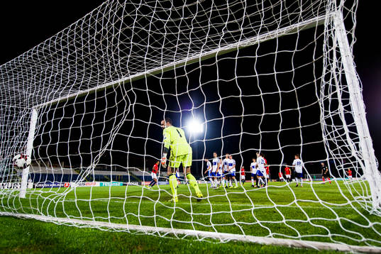 Mohamed Elyounoussi of Norway scores 5-0 behind goalkeeper