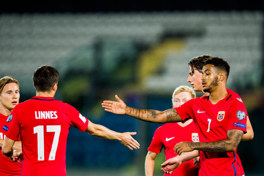 Joshua King of Norway celebrates with his teammates