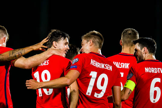 Ole Kristian Selnæs of Norway celebrates with his teammates