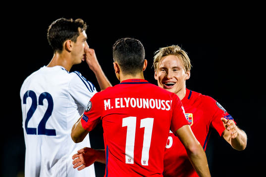 Mohamed Elyounoussi of Norway celebrates with his teammate