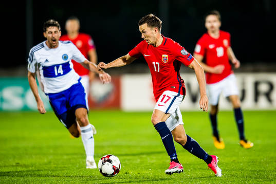 Michele Cervellini of San Marino and Martin Linnes of Norway