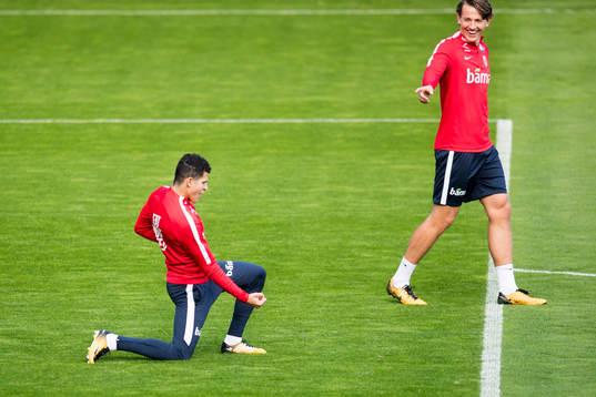 Tarik Elyounoussi and Sander Berge of Norway