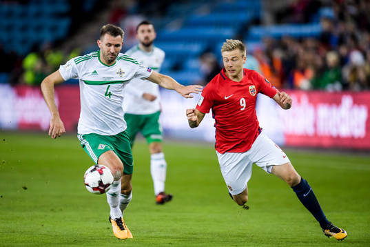 Gareth McAuley of Northern Ireland and Norway Alexander