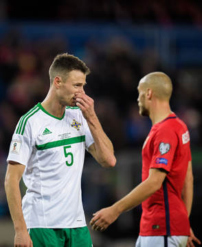 Jonny Evans of Northern Ireland looks dejected