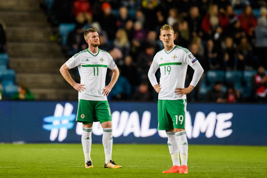 Chris Brunt and George Saville of Northern Ireland  looks