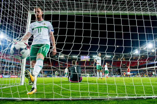 Chris Brunt of Northern Ireland looks dejected