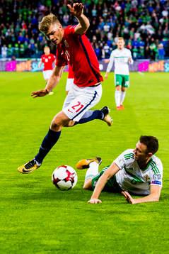 Alexander Sørloth of Norway and Jonny Evans of Northern