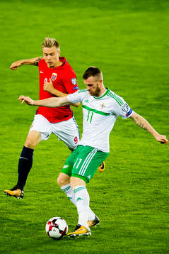 Alexander Toft Søderlund of Norway and Chris Brunt of