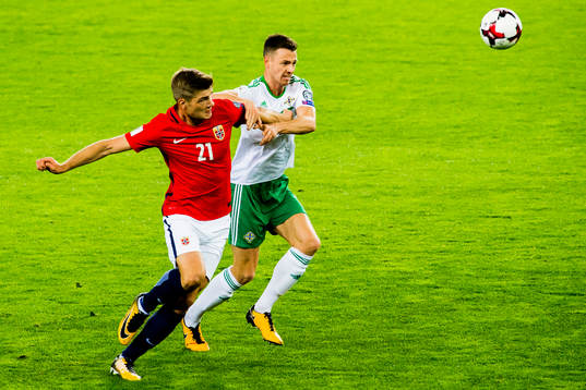Alexander Sørloth of Norway and Jonny Evans of Northern