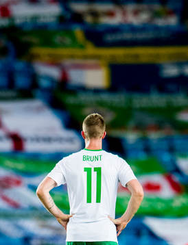 Chris Brunt of Northern Ireland looks dejected