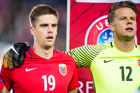 Markus Henriksen and goalkeeper Ørjan Håskjold Nyland of