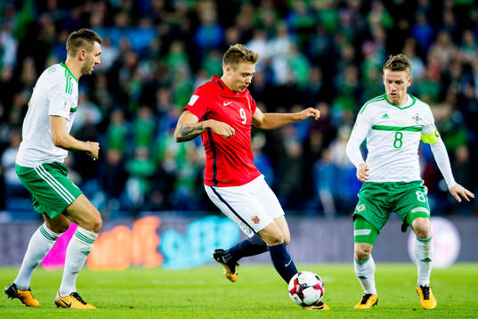 Gareth McAuley of Northern Ireland, Alexander Toft
