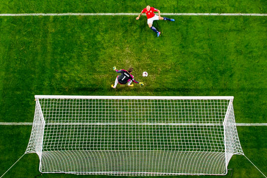 Goalkeeper Michael McGovern of Northern Ireland saves an