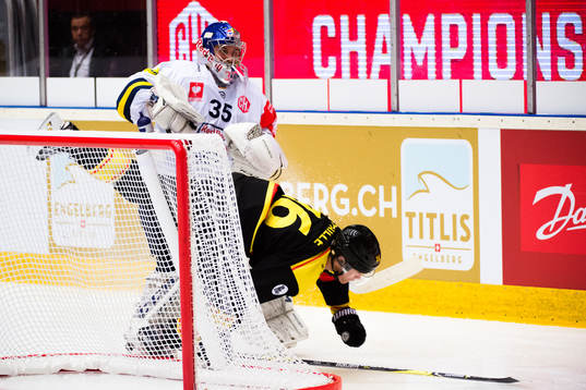 Daniel Paille of Brynäs collides with goalkeeper Kevin
