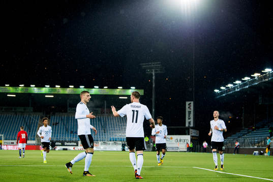 Cedric Teuchert of Germany celebrates with teammates