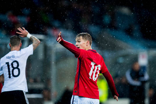 Marcel Hartel of Germany and Martin Ødegaard of Norway