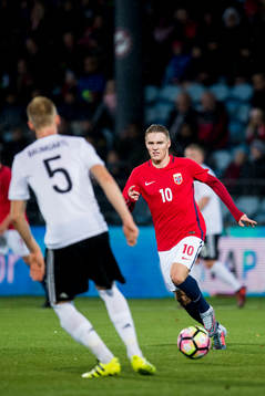 Timo Baumgartl of Germany and Martin Ødegaard of Norway