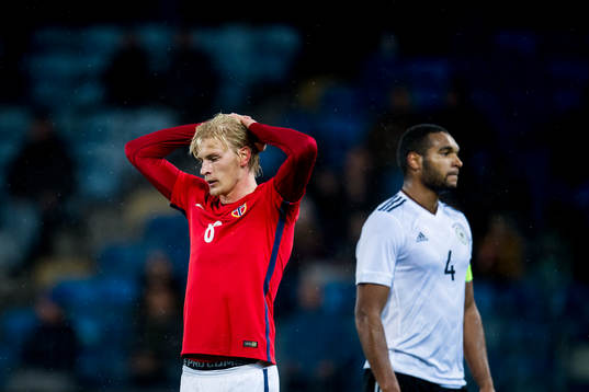 Morten Thorsby of Norway and Jonathan Tah of Germany