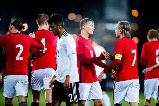 Martin Ødegaard and Iver Fossum of Norway celebrate 1-1
