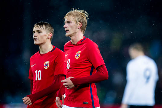 Martin Ødegaard and Morten Thorsby of Norway celebrate 1-1