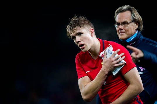 Kristoffer Ajer of Norway with an injury
