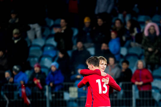 Erlend Reitan and Martin Ødegaard of Norway celebrate