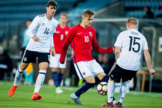 Pascal Stenzel of Germany, Martin Ødegaard of Norway  and