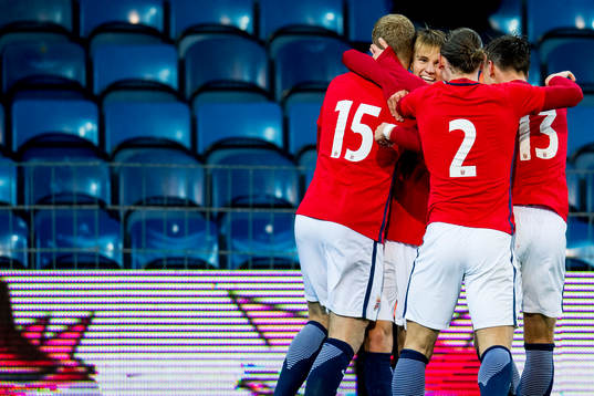 Martin Ødegaard of Norway celebrates with teammates