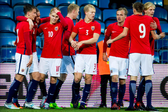 Martin Ødegaard of Norway celebrates with teammates