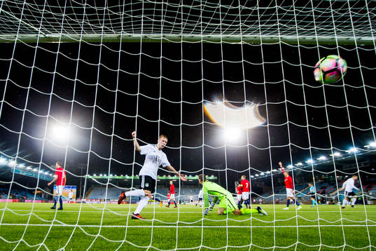 Phillipp Ochs of Germany kicks the ball into the net