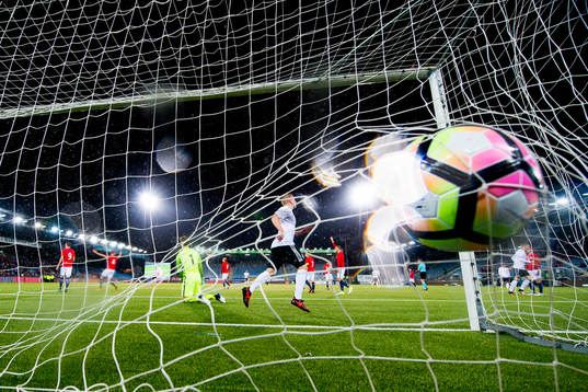 Phillipp Ochs of Germany kicks the ball into the net